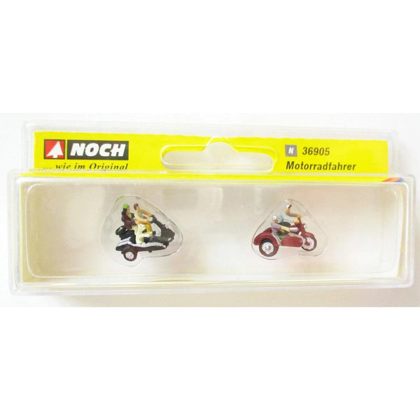 N Motorcyclists (2 Figures on 2 Different Motorbikes, 1 Dog)