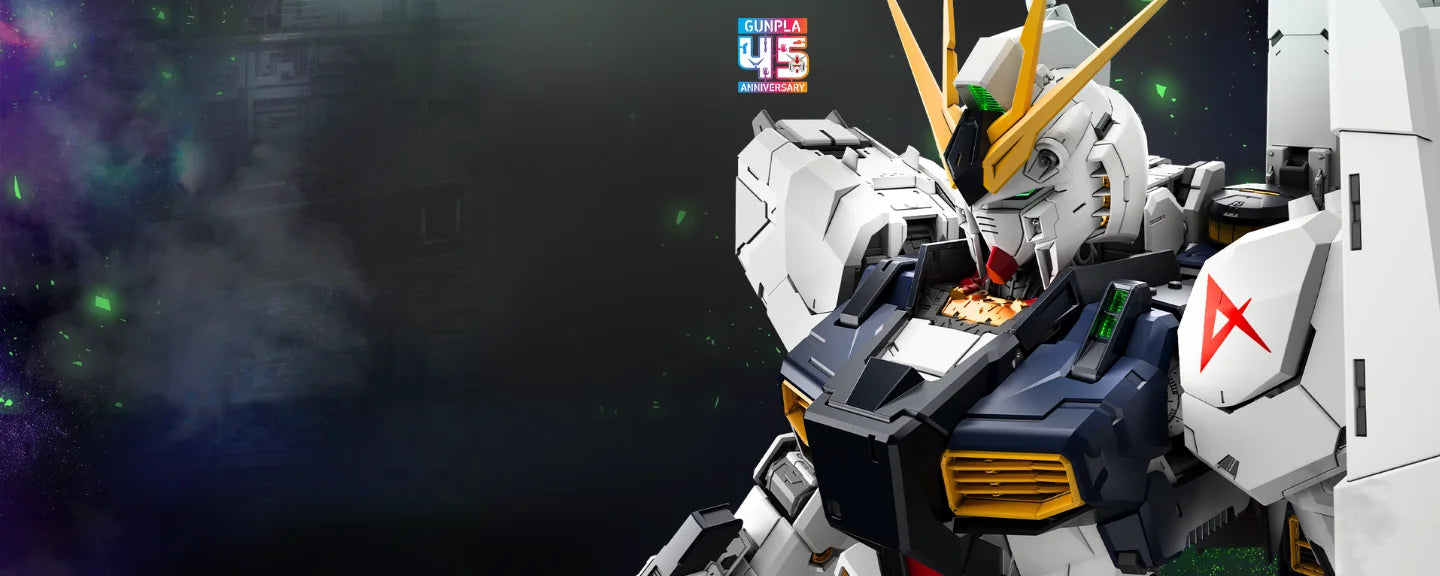Close-up of the PG Unleashed Nu Gundam model with white armour and yellow antennae.
